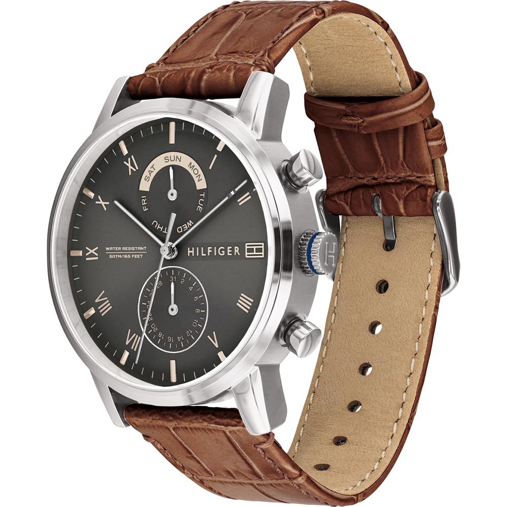Side view of Tommy Hilfiger watch showing brown leather strap with crocodile texture and beige inner lining