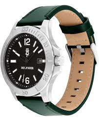 Tommy Hilfiger watch showing green leather strap with brown suede reverse side and buckle