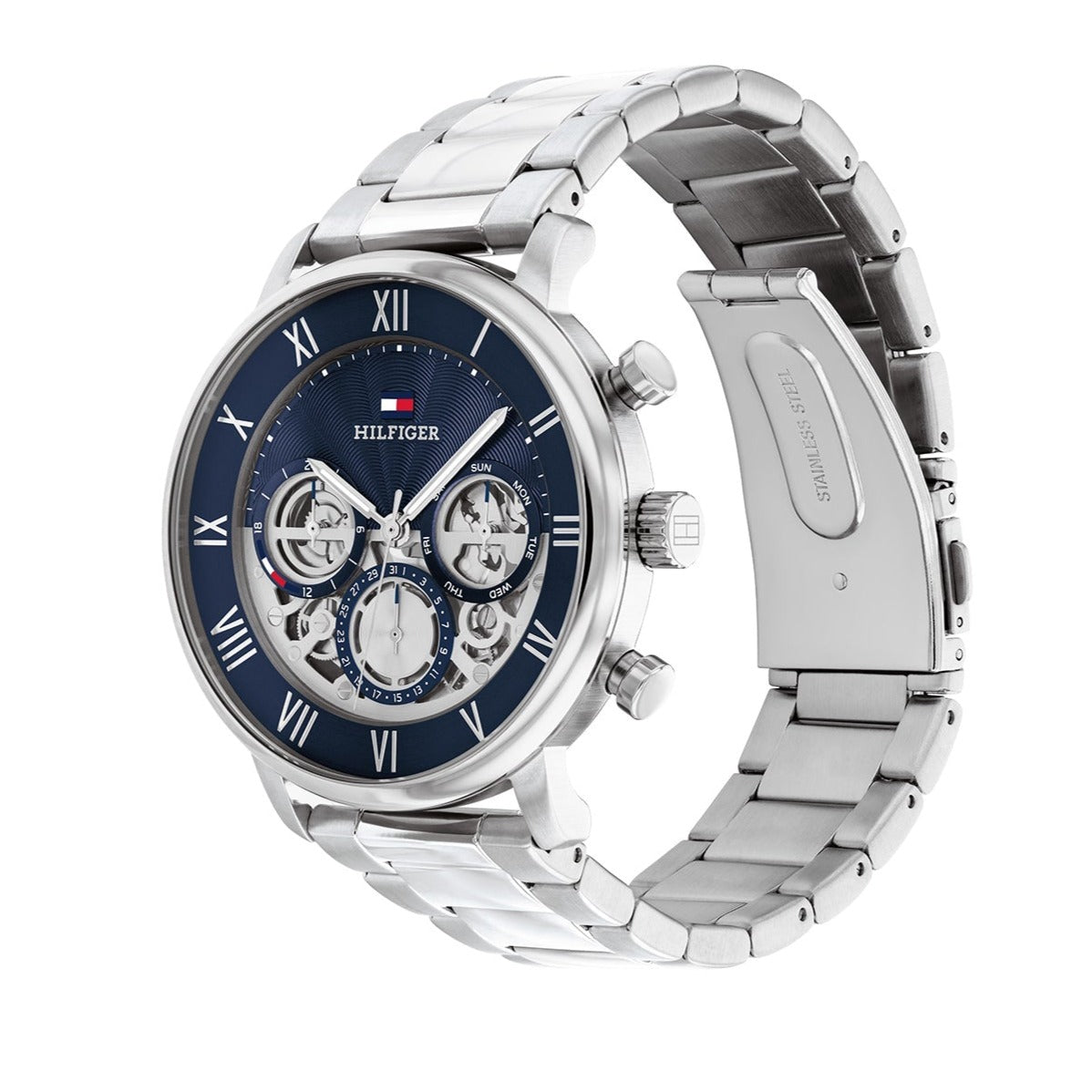 Tommy Hilfiger Legend watch three-quarter view showing blue dial and silver steel bracelet strap