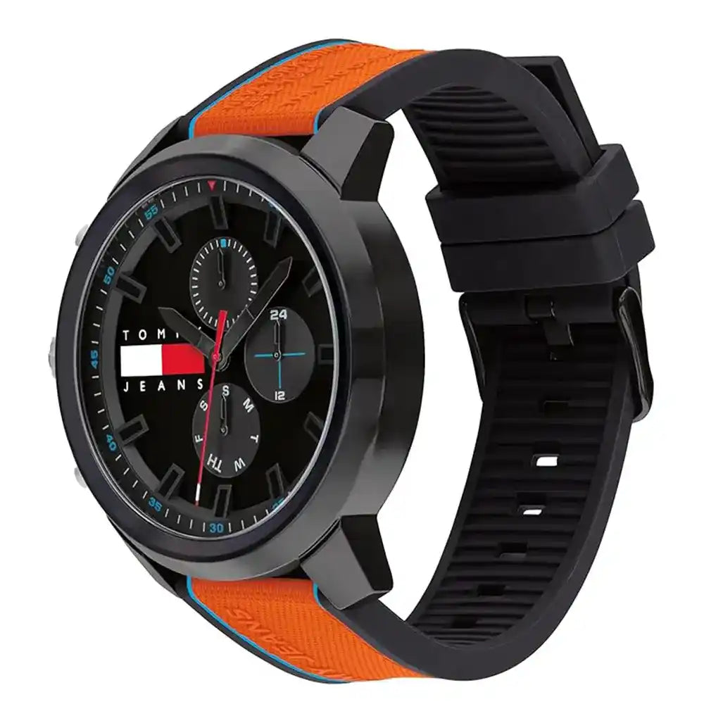 Tommy Hilfiger watch at angle showing black case with orange and black silicone strap