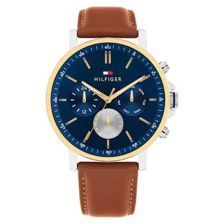 Tommy Hilfiger chronograph watch with blue dial, gold bezel, and brown leather strap