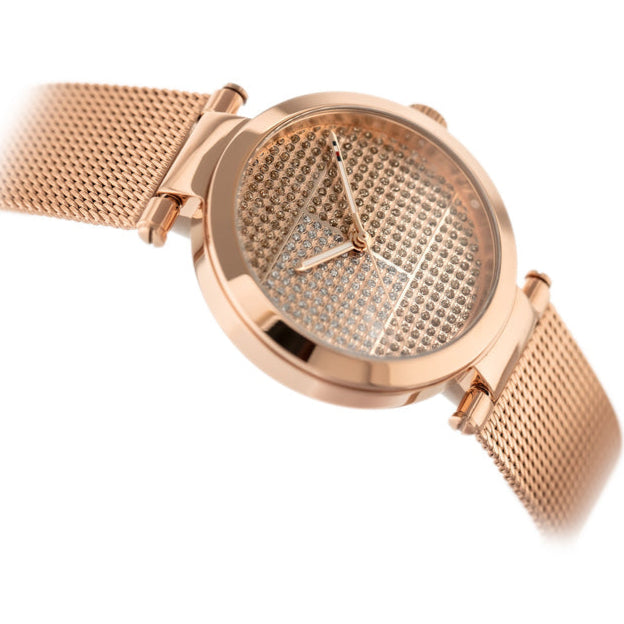 Angled view of Tommy Hilfiger 1781868 watch displaying rose gold case and mesh strap with crystal-embellished dial