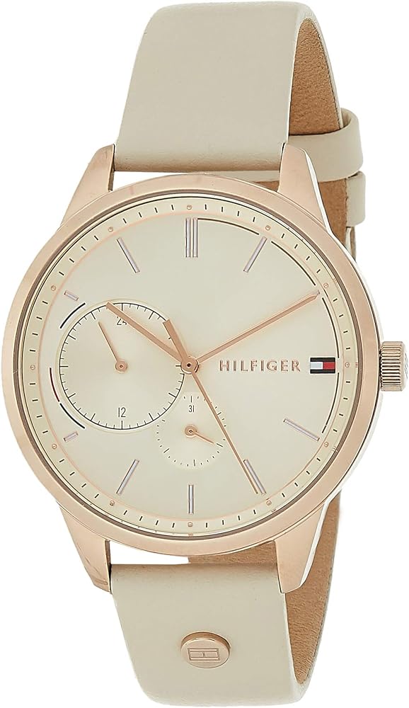 Tommy Hilfiger women's watch angled view showing cream leather strap and rose gold case