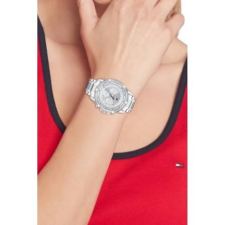 Silver ladies watch on wrist with crystal bezel and multi-function dial