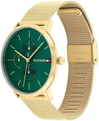 Side angle view of Tommy Hilfiger women's watch with green dial and gold mesh strap