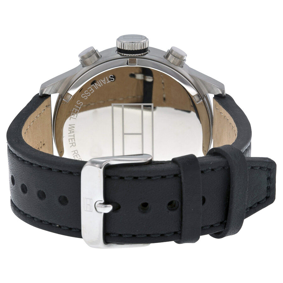 Caseback view of Tommy Hilfiger watch showing black leather strap and buckle closure