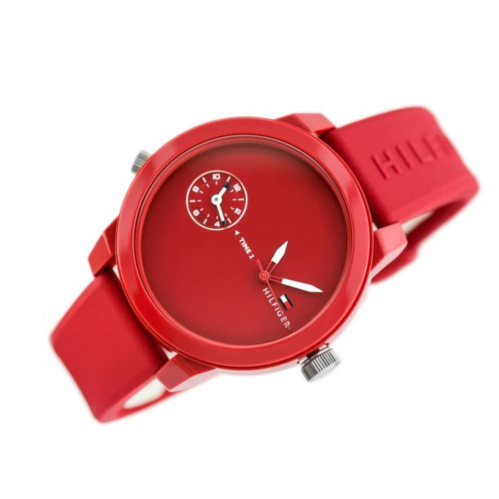 Tommy Hilfiger 1791323 watch with red rubber strap and round red dial showing side profile