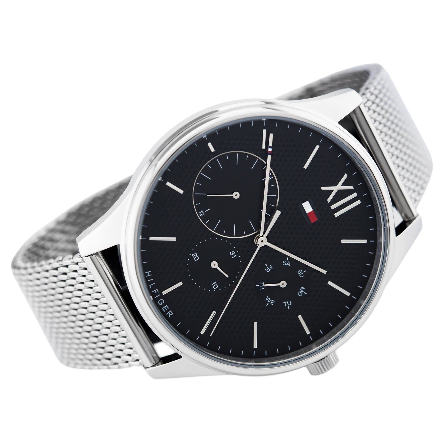Angled side view of Tommy Hilfiger chronograph watch with mesh band and black dial
