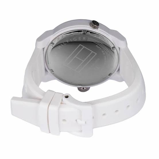 Tommy Hilfiger watch caseback showing crystal and white rubber strap