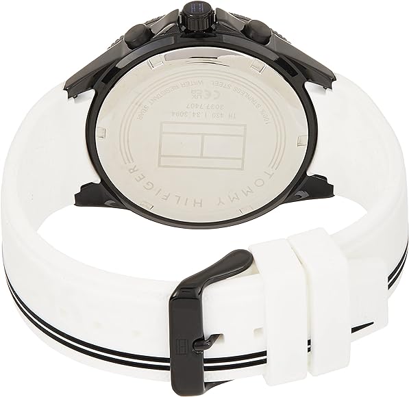 Tommy Hilfiger watch caseback showing engravings and white rubber strap