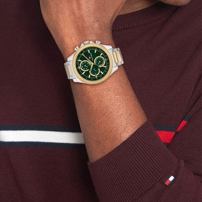 Tommy Hilfiger 1792079 watch worn on wrist with green chronograph dial visible