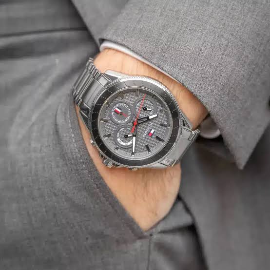 Tommy Hilfiger Aiden chronograph watch worn on wrist with grey dial and three subdials visible