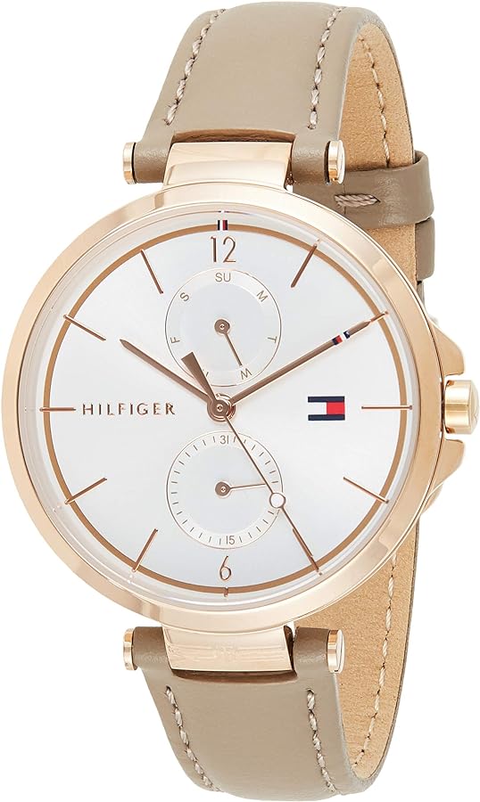 Tommy Hilfiger Angela watch angled view showing white dial with rose gold markers and brown leather strap