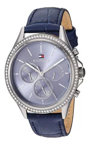 Side angled view of Tommy Hilfiger Ari watch showing blue leather strap and case profile