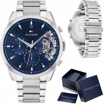 Tommy Hilfiger Baker watch front and side views with stainless steel band and packaging box