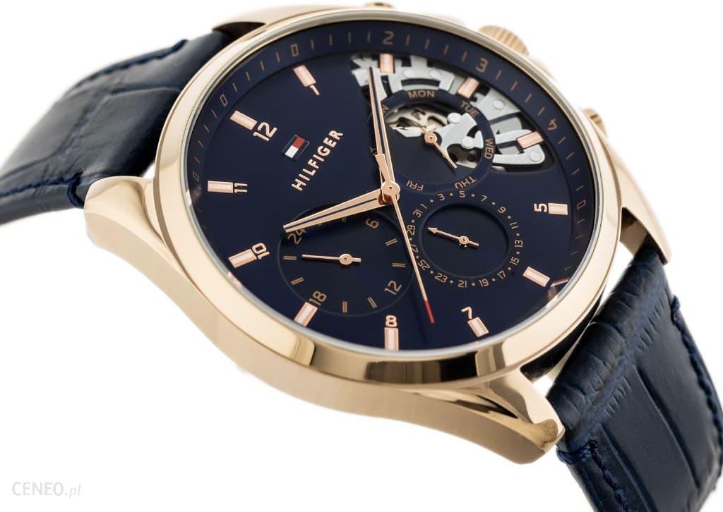 Tommy Hilfiger Baker men's watch angled view with navy leather strap and rose gold case