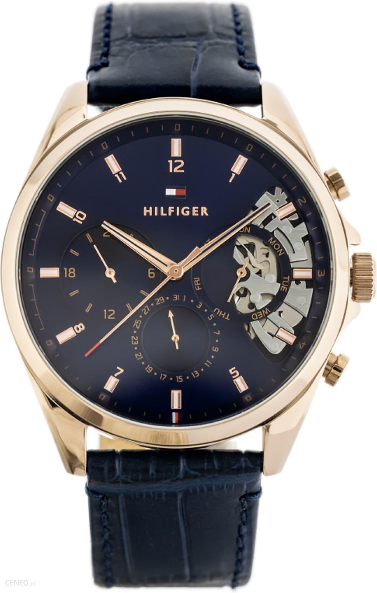 Tommy Hilfiger Baker men's watch front view with skeleton window and navy leather strap