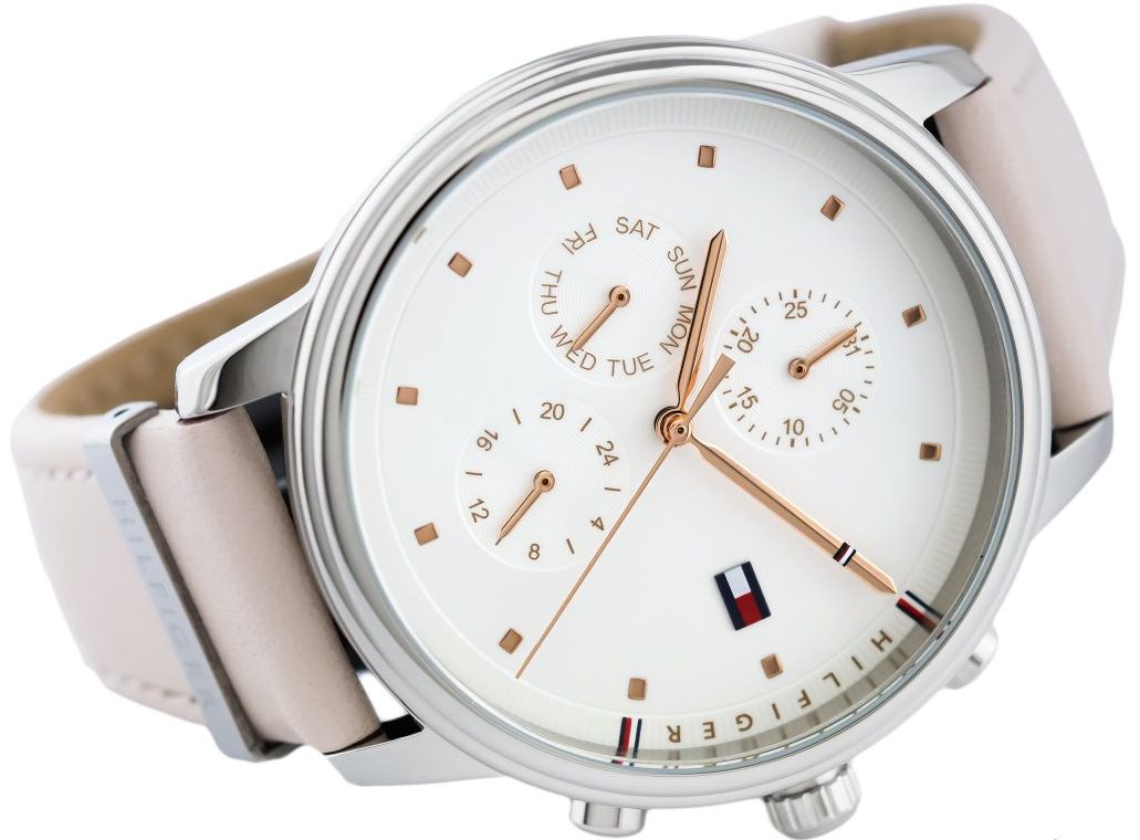 Tommy Hilfiger Blake chronograph watch on wrist displaying silver case and pink leather strap