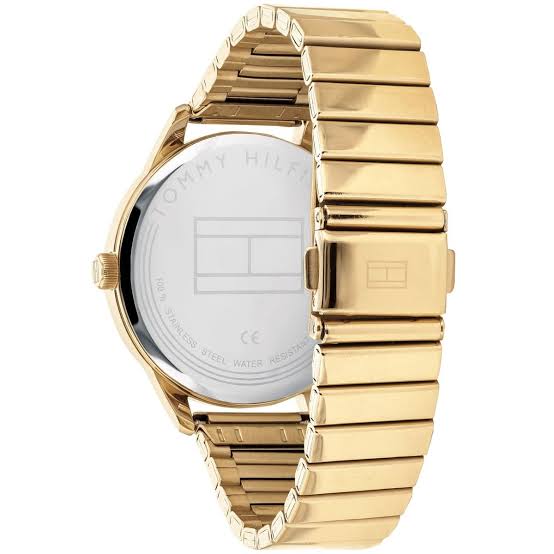 Back of Tommy Hilfiger Brooke watch showing caseback and gold steel strap