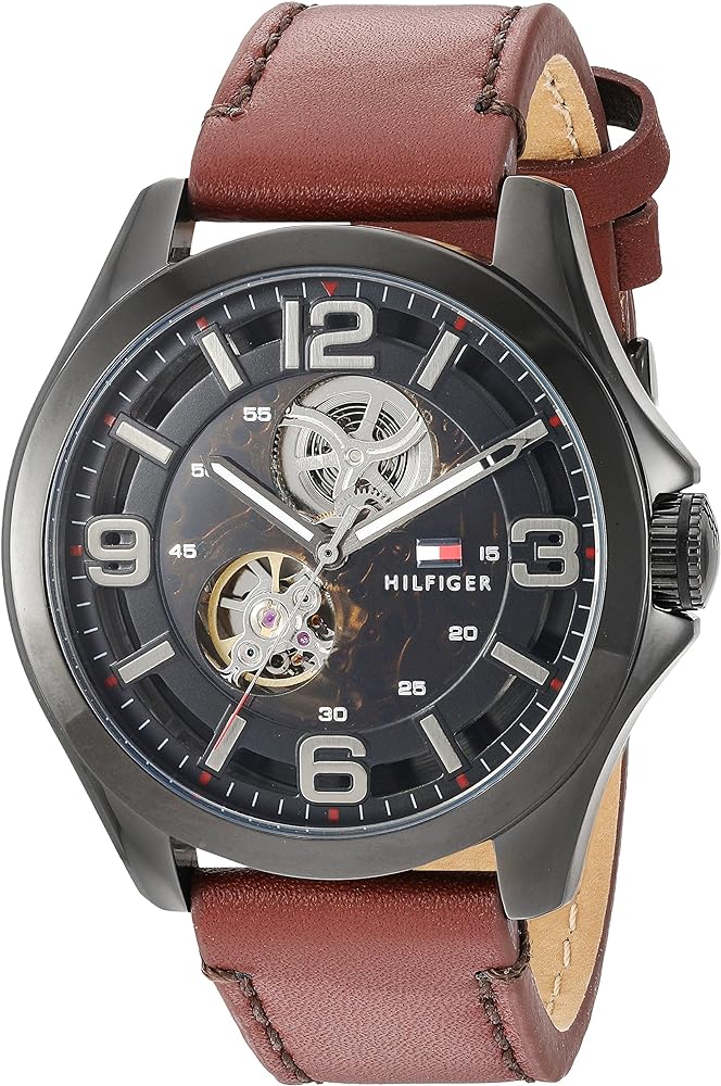 Tommy Hilfiger Bruce automatic watch angled view showing skeleton dial and brown leather strap