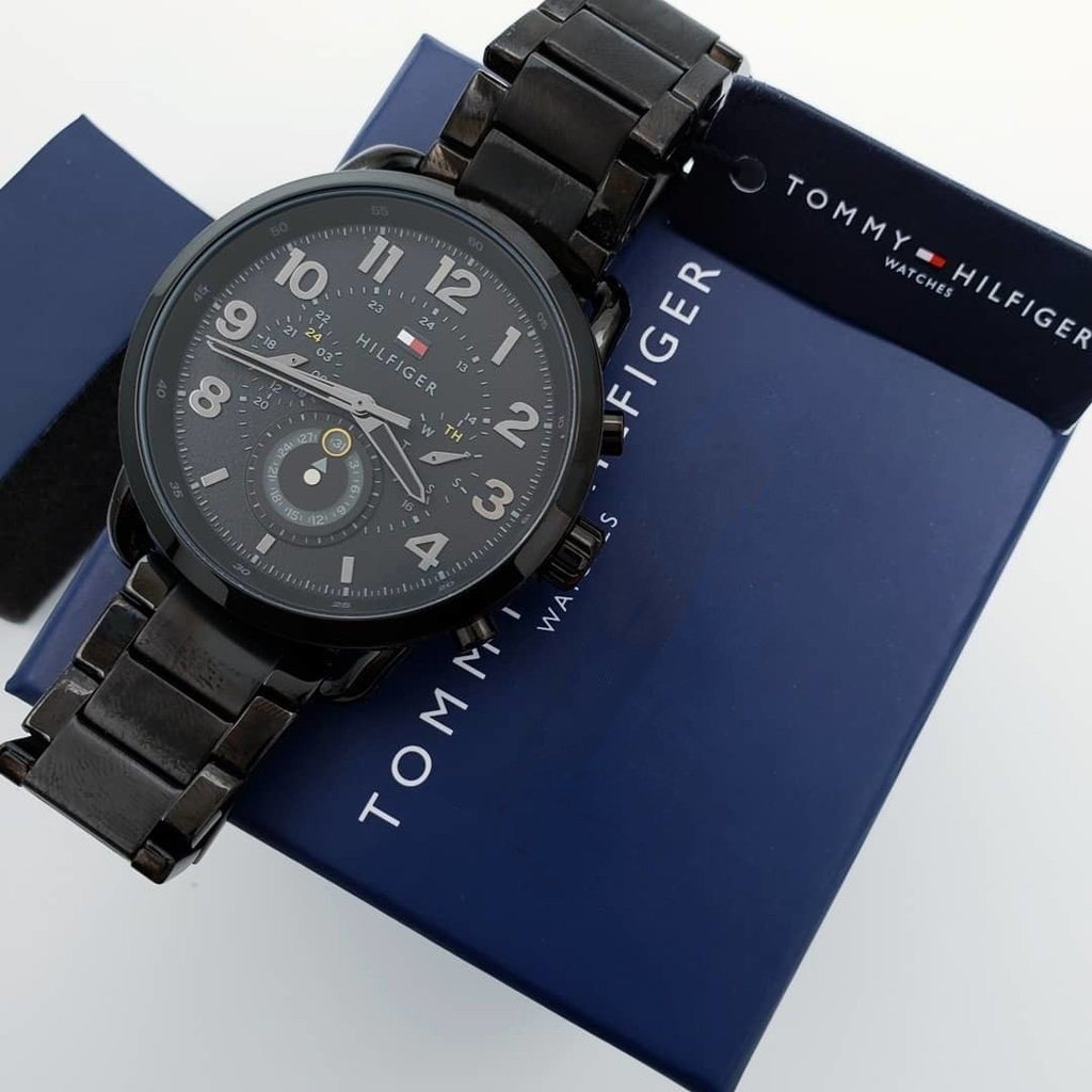 Tommy Hilfiger chronograph watch with black presentation box and instruction manual