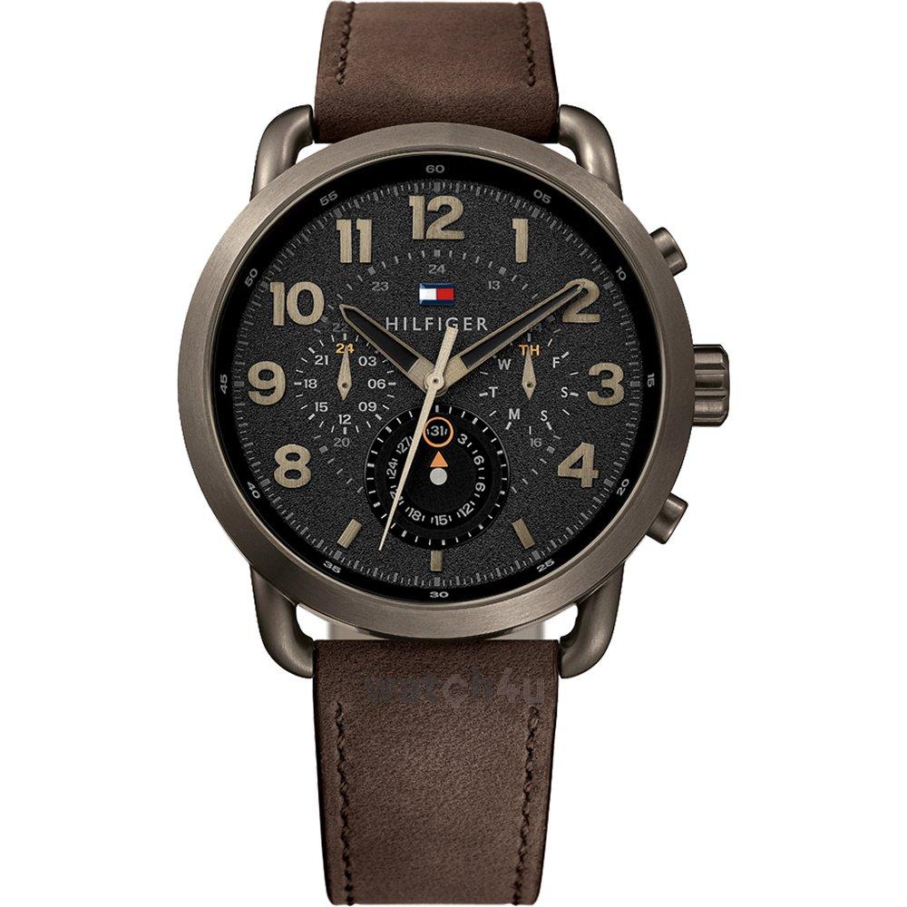 Tommy Hilfiger chronograph watch with black dial, cream Arabic numerals, brown leather strap, and gunmetal case