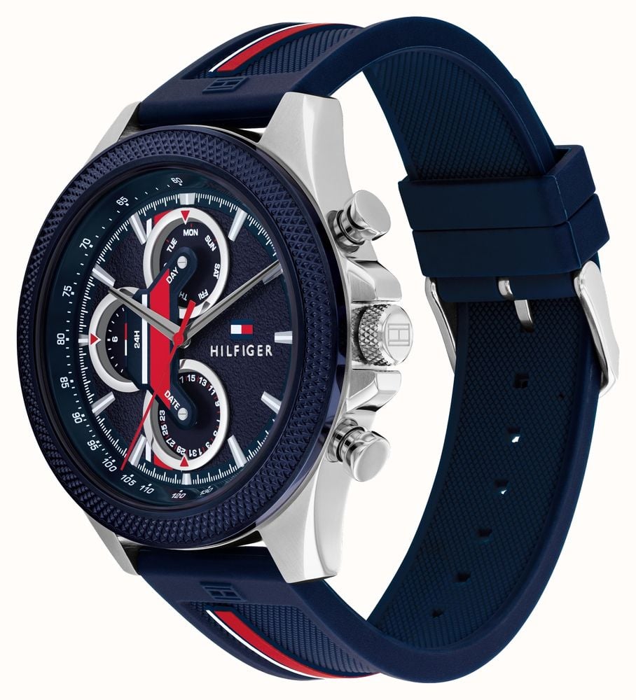 Tommy Hilfiger Clark watch angled view showing stainless steel case and blue/red silicone strap