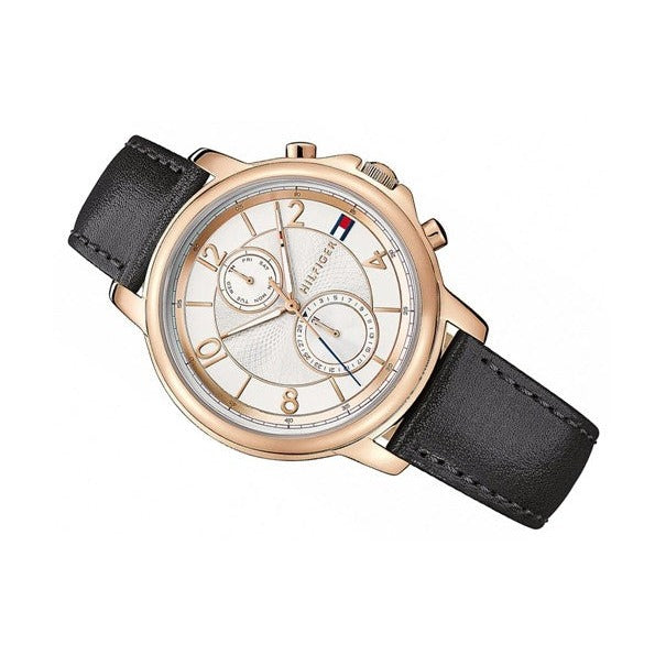Tommy Hilfiger Claudia women's watch on wrist with black leather strap and white dial visible