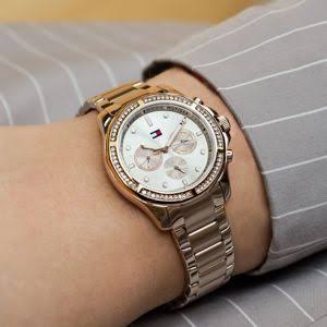 Tommy Hilfiger Damon rose gold watch worn on wrist showing dial and stainless steel bracelet