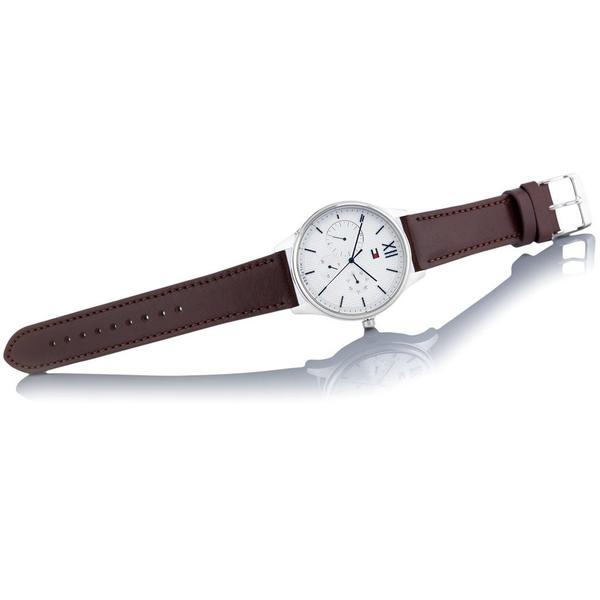Tommy Hilfiger Damon watch showing brown leather strap with metal buckle