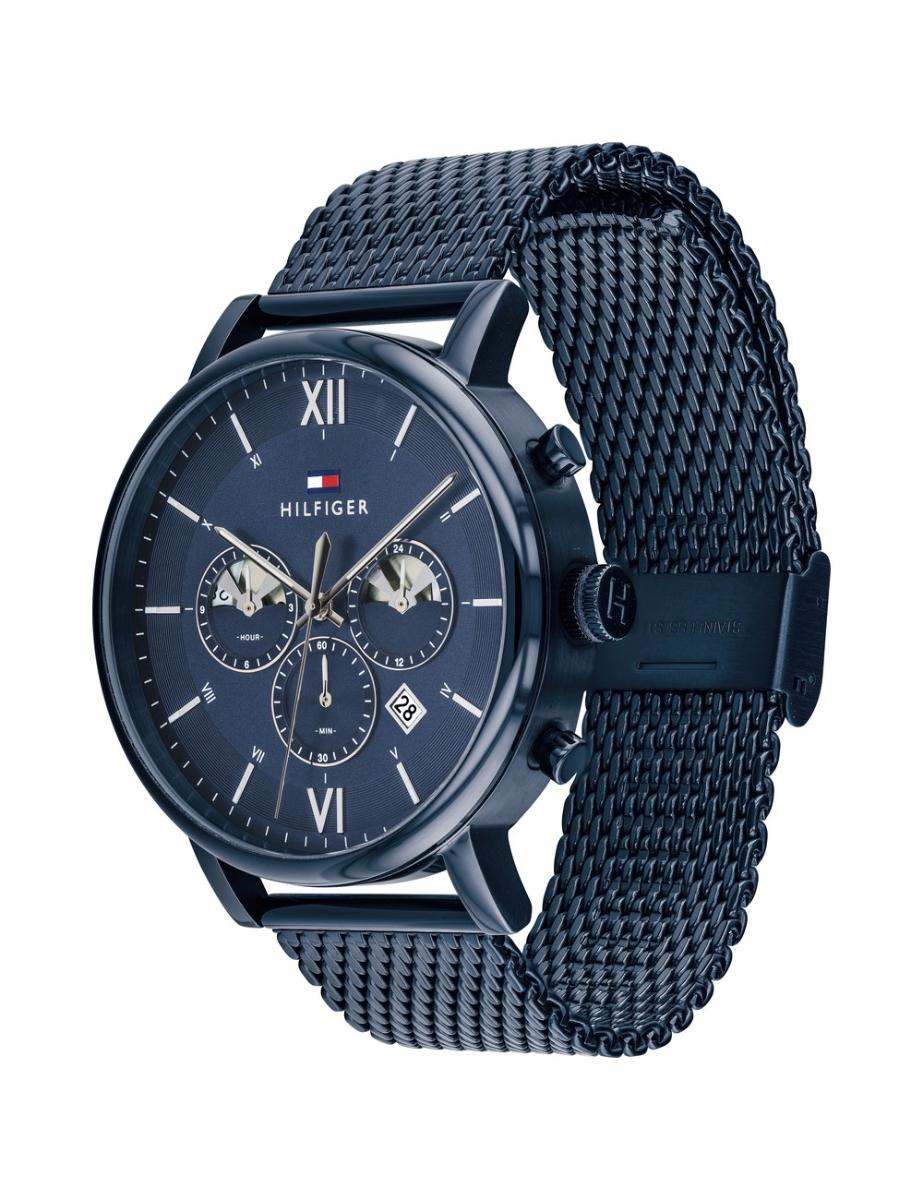 Tommy Hilfiger Evan watch at angle showing blue mesh strap and blue dial with chronograph complications