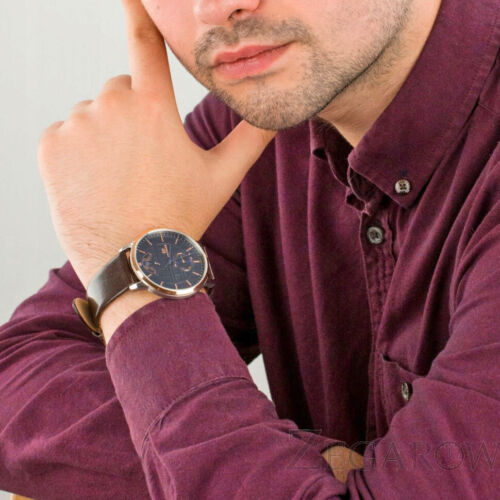 Tommy Hilfiger Hunter watch worn on wrist with navy dial and rose gold accents