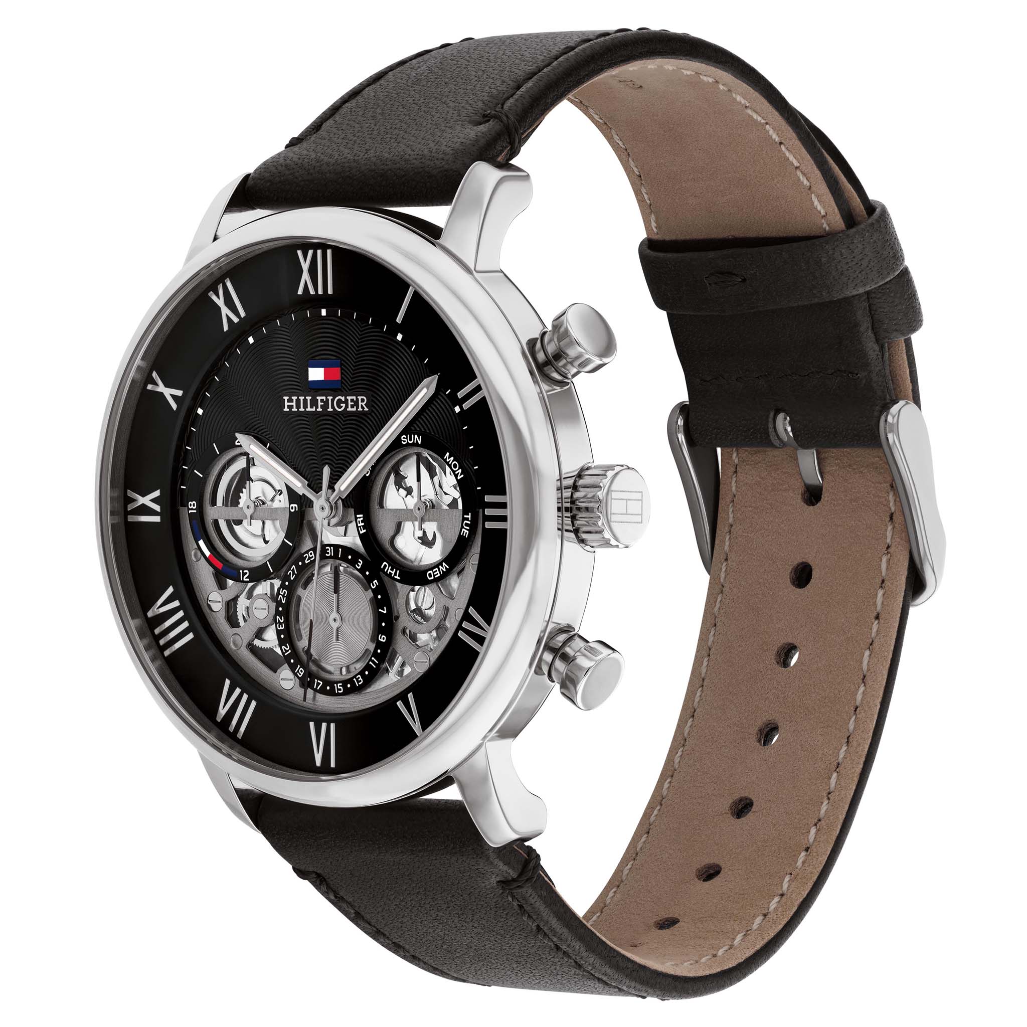 Side angle view of Tommy Hilfiger Legend chronograph with visible leather strap and tan lining