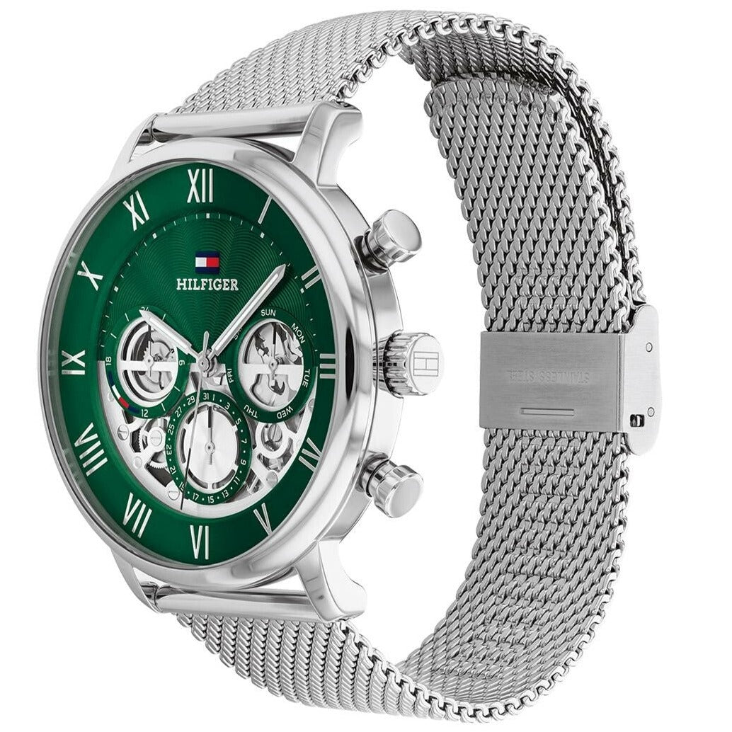 Side angle view of Tommy Hilfiger Legend watch showing green dial and stainless steel mesh bracelet