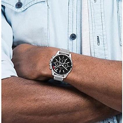 Man wearing Tommy Hilfiger Mason multifunction watch with light blue shirt