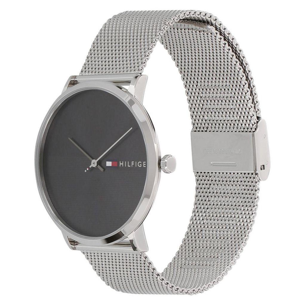 Side view of Tommy Hilfiger men's watch with silver mesh strap and magnetic closure