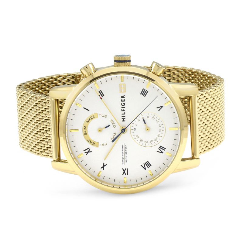 Gold watch with white dial, Roman numerals, and dual subdials displayed at angle