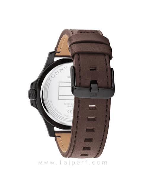 Tommy Hilfiger RYAN watch case back showing silver dial side and brown leather strap