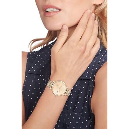 Tommy Hilfiger rose gold mesh watch worn on wrist