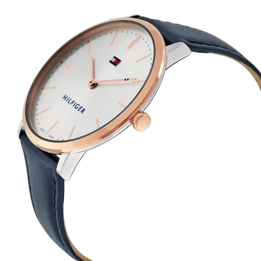 Tommy Hilfiger Ultra Slim watch angled view showing white dial with rose gold hands and navy strap