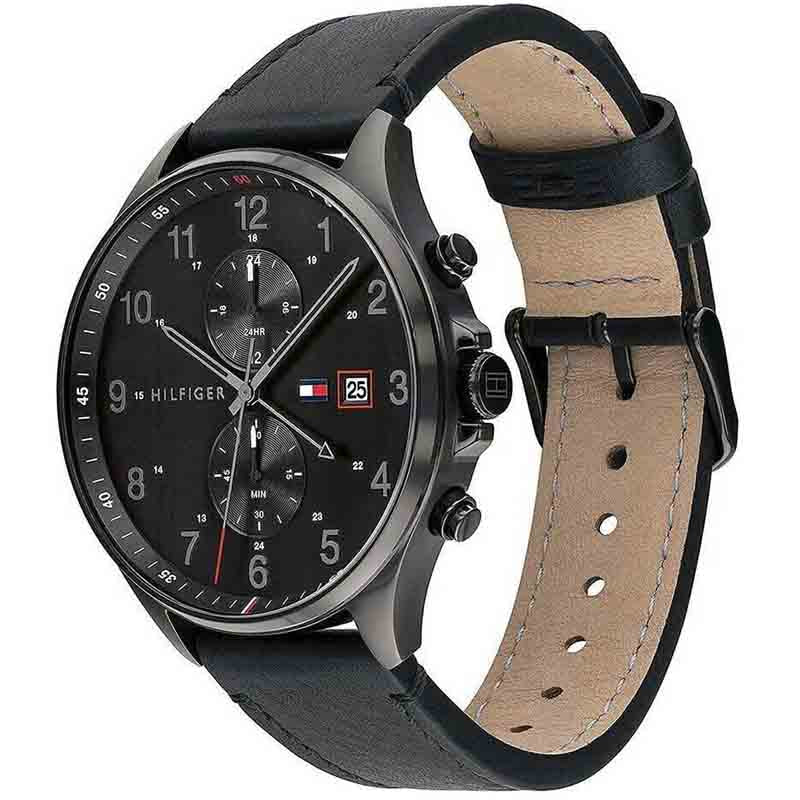 Tommy Hilfiger West watch showing chronograph subdials and tan leather interior of black strap