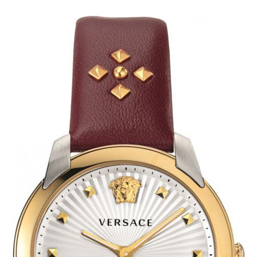 Close-up of Versace Audrey dial with Medusa head logo and gold diamond hour markers