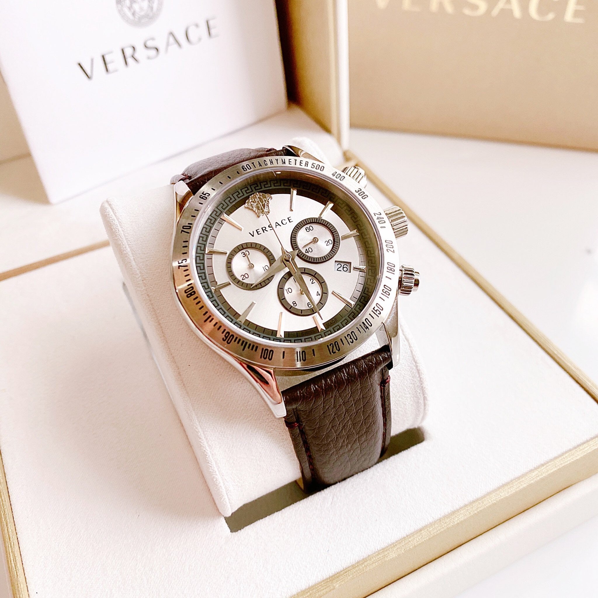 Versace Classic Chronograph watch displayed in Versace branded packaging and box