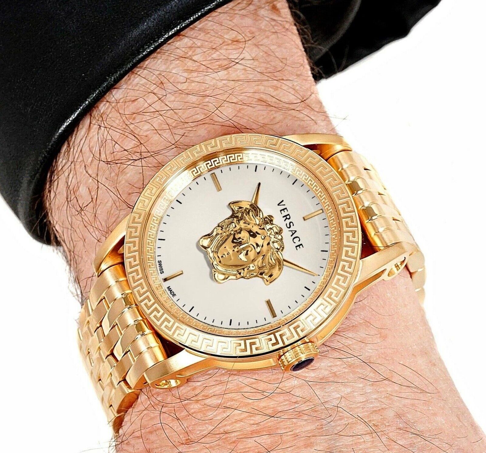 Versace Empire white gold watch worn on wrist showing white dial with Medusa center