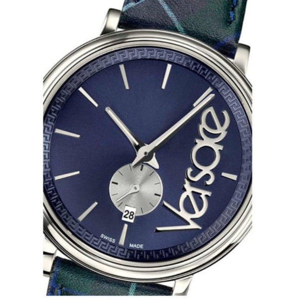 Close-up of V-Circle watch dial showing navy face, Versace logo, hour markers, and subdial