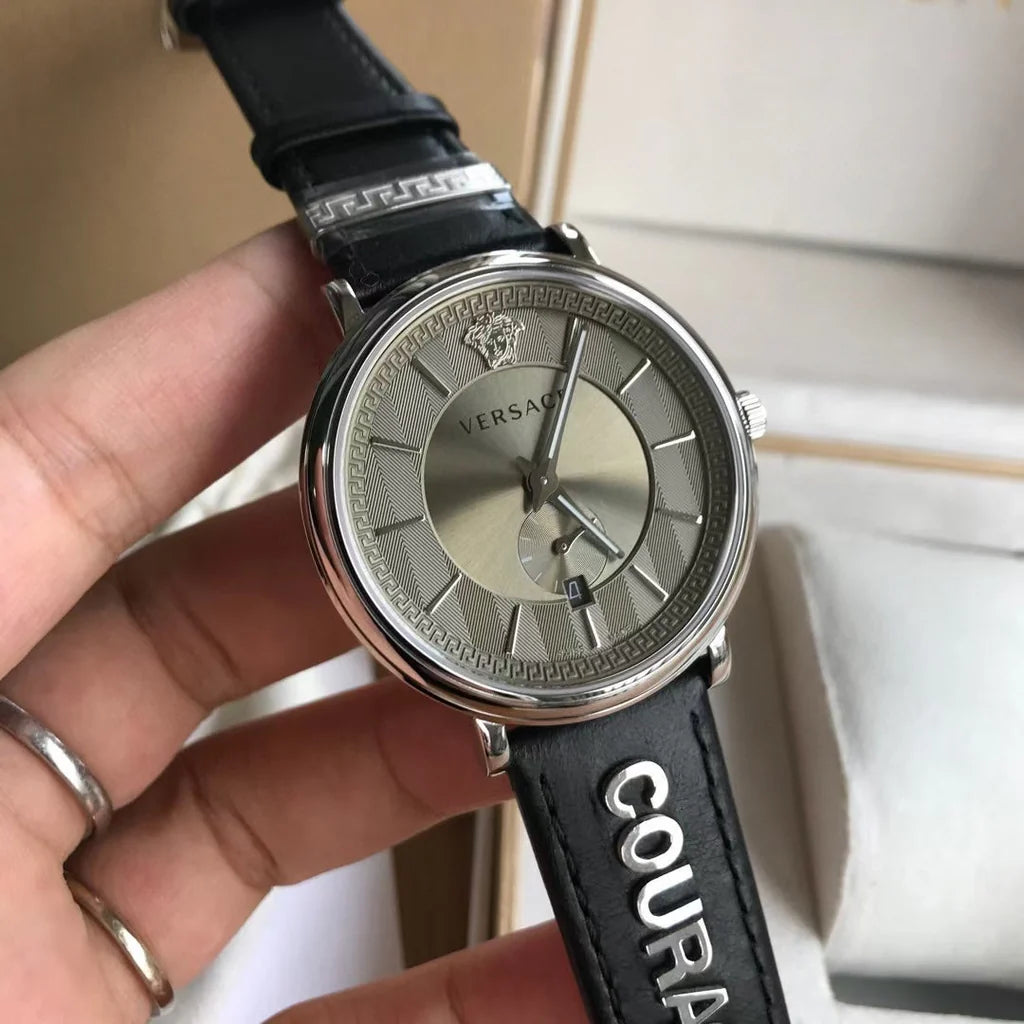 Versace men's watch worn on wrist, stainless steel and black leather strap