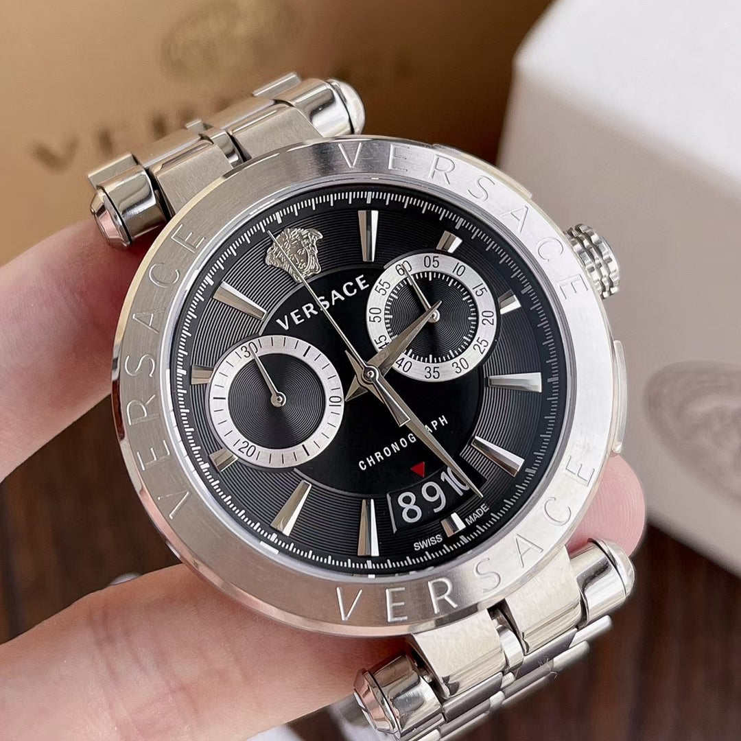 Versace VBR080018 chronograph watch worn on wrist with silver case and black dial