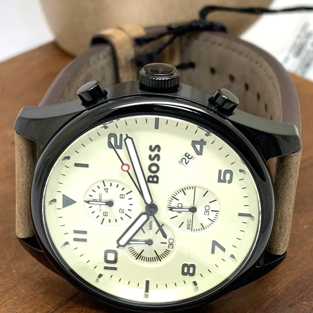 Close-up of Hugo Boss View dial with beige face, three chronograph subdials, and BOSS branding