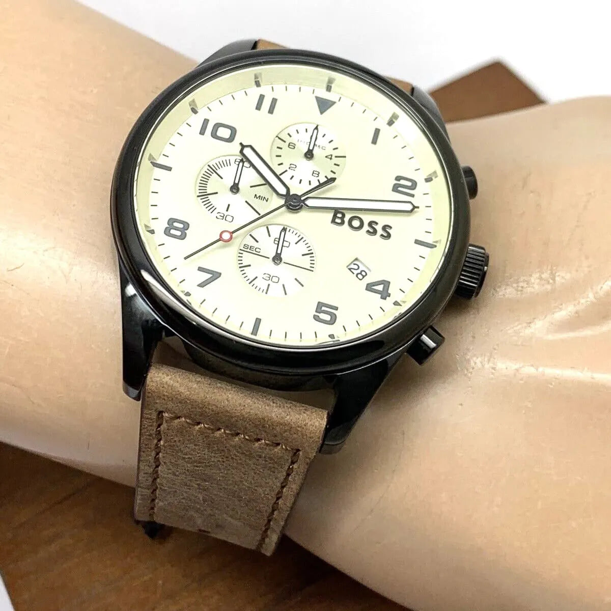Hugo Boss View chronograph watch on table showing beige dial and chronograph pushers