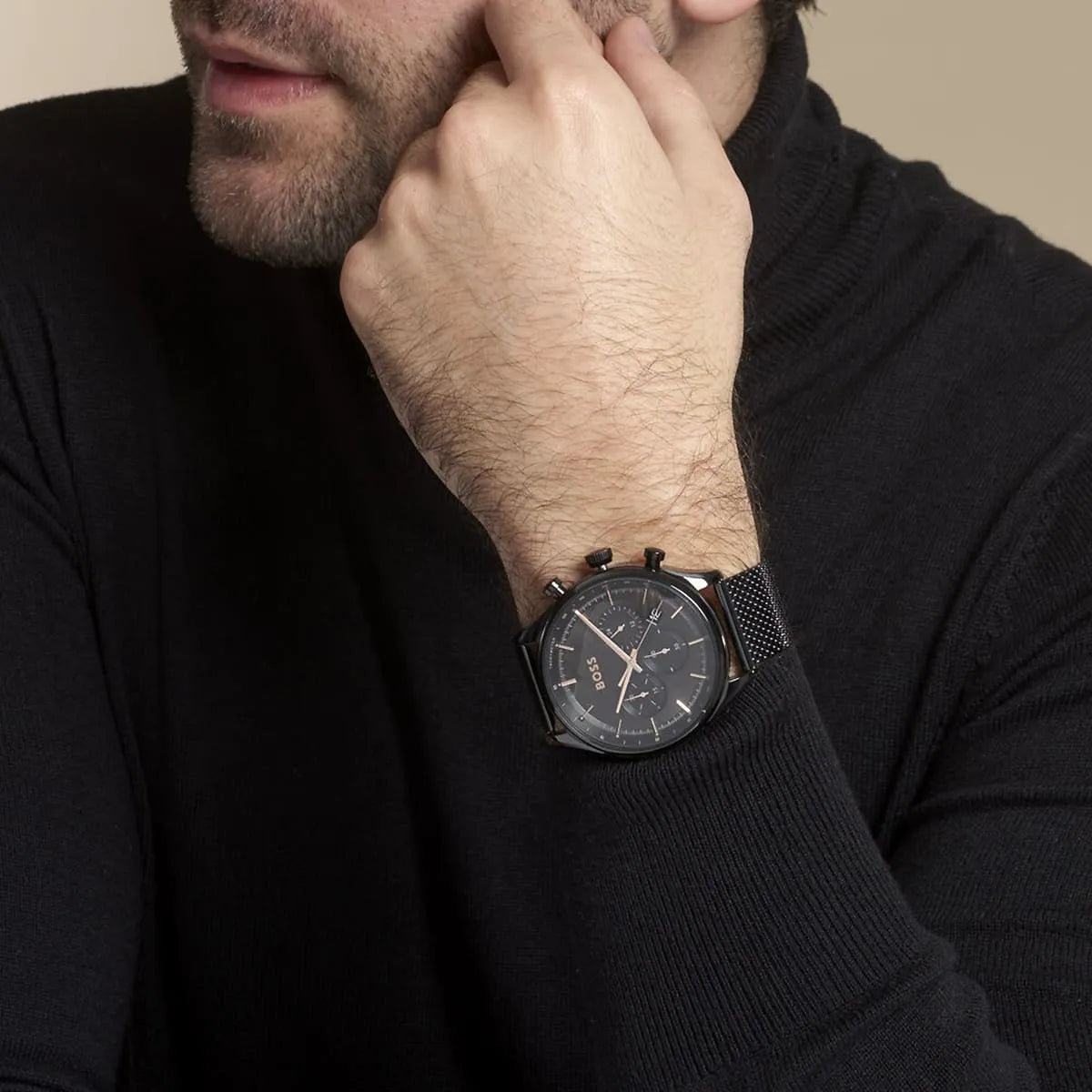Hugo Boss Gregor watch on male wrist with black sweater showing side view